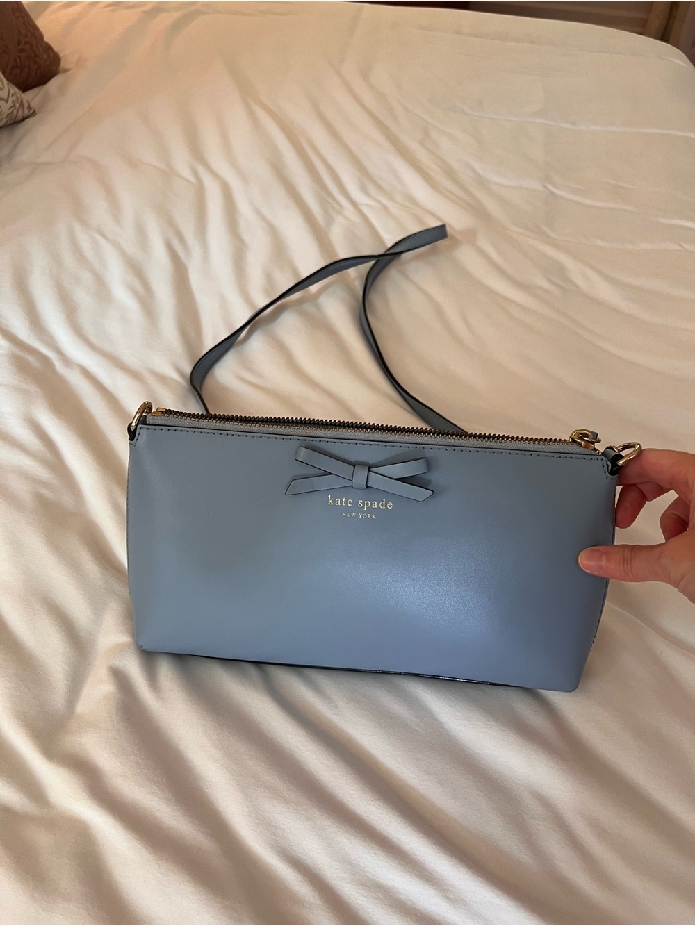kate spade light blue leather crossbody with bow detail